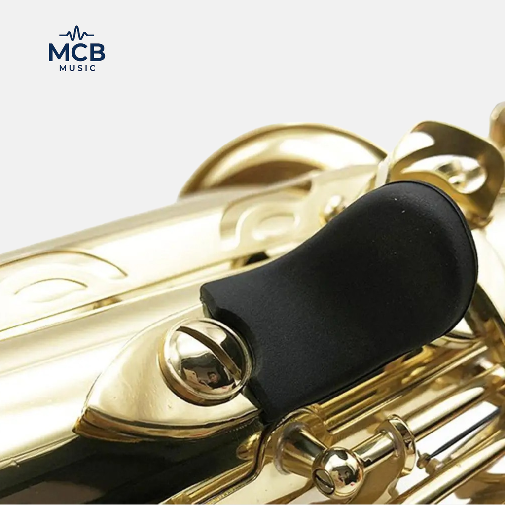 Apoio de polegar para saxofones