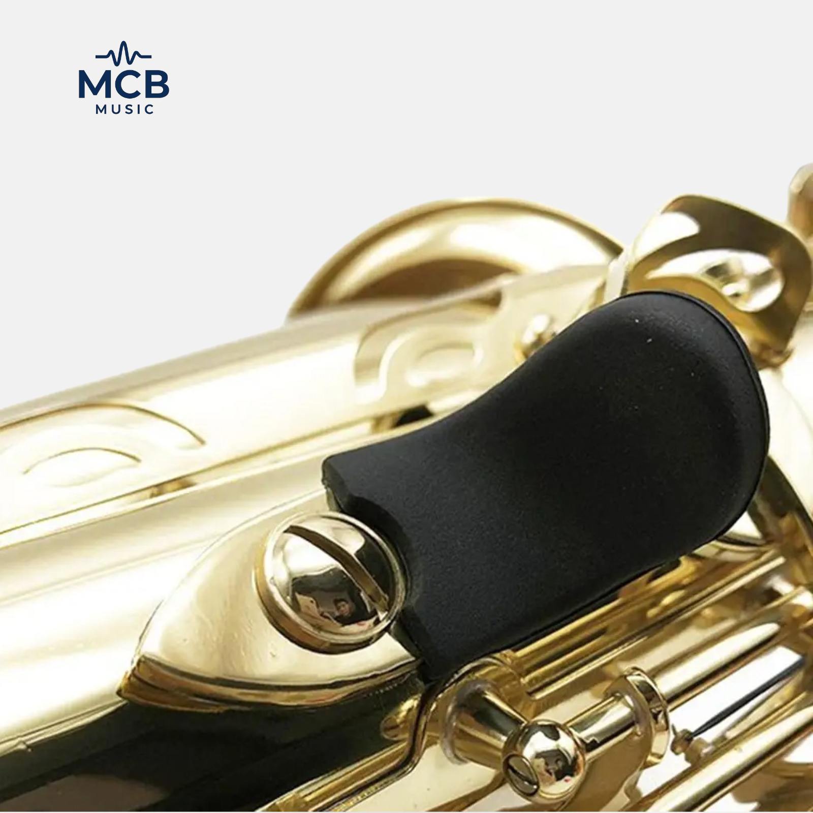 Apoio de polegar para saxofones